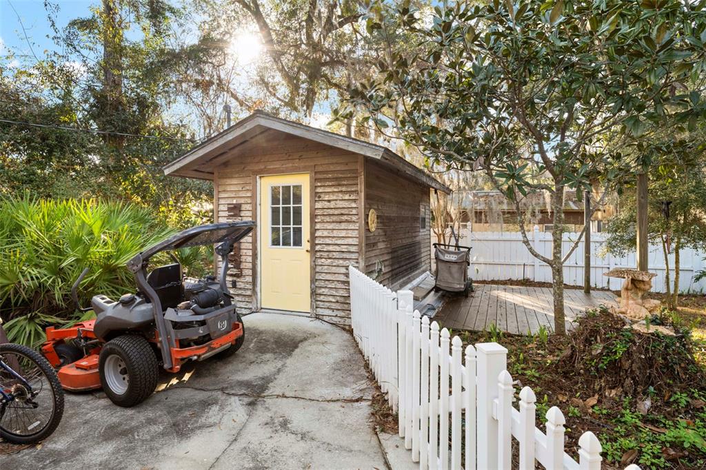 16 52nd Street Yankeetown, FL 34498 - Photo 9 of 63 a view of a house with a cars park side of a road