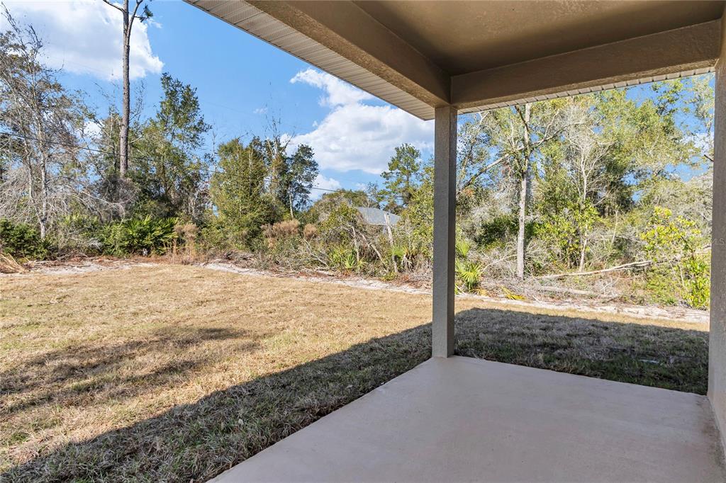 15070 Southwest 21st Ter Road Ocala, FL 34473 - Photo 40 of 47 a view of a yard with wooden fence
