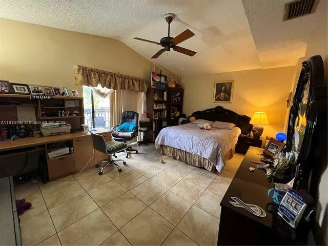 a room with a sink and a mirror