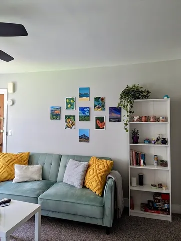 a living room with furniture and a couch