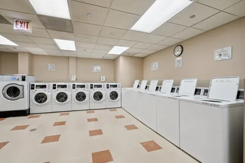 a room with furniture and white walls