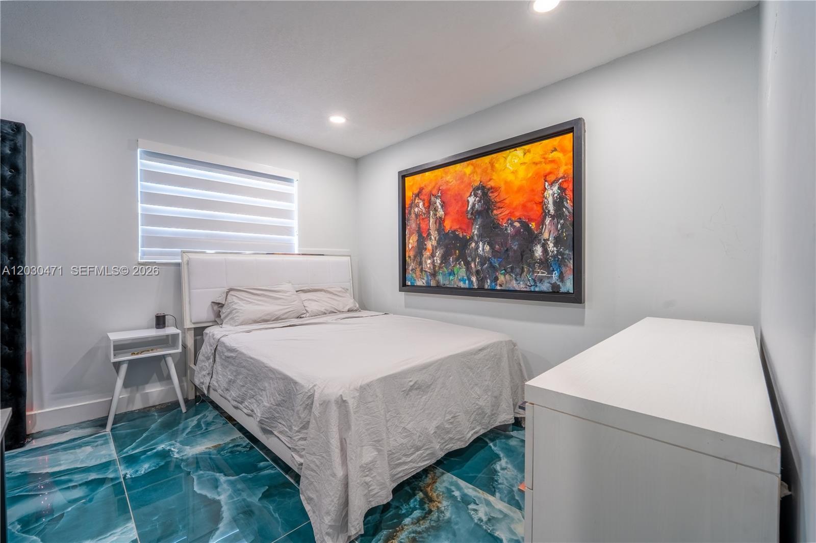 11851 Southwest 181st Street Miami, FL 33177 - Photo 8 of 25 a bedroom with a bed and a large window