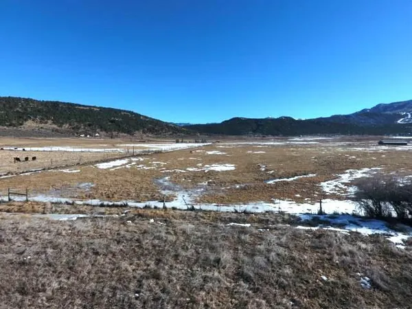 a view of lake with mountain