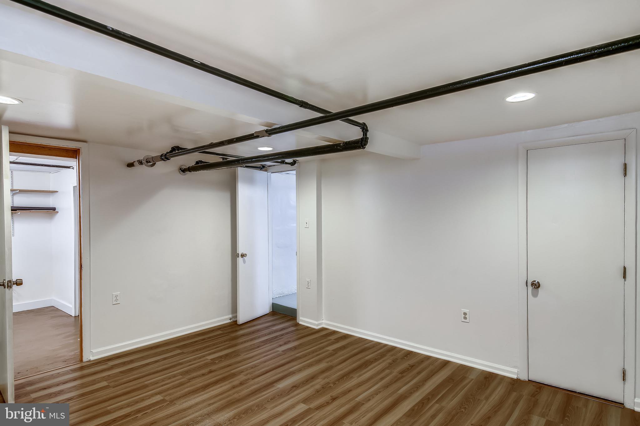 702 Wayne Avenue Silver Spring, MD 20910 - Photo 25 of 41 LL Rec Room with door to full bath & cloet