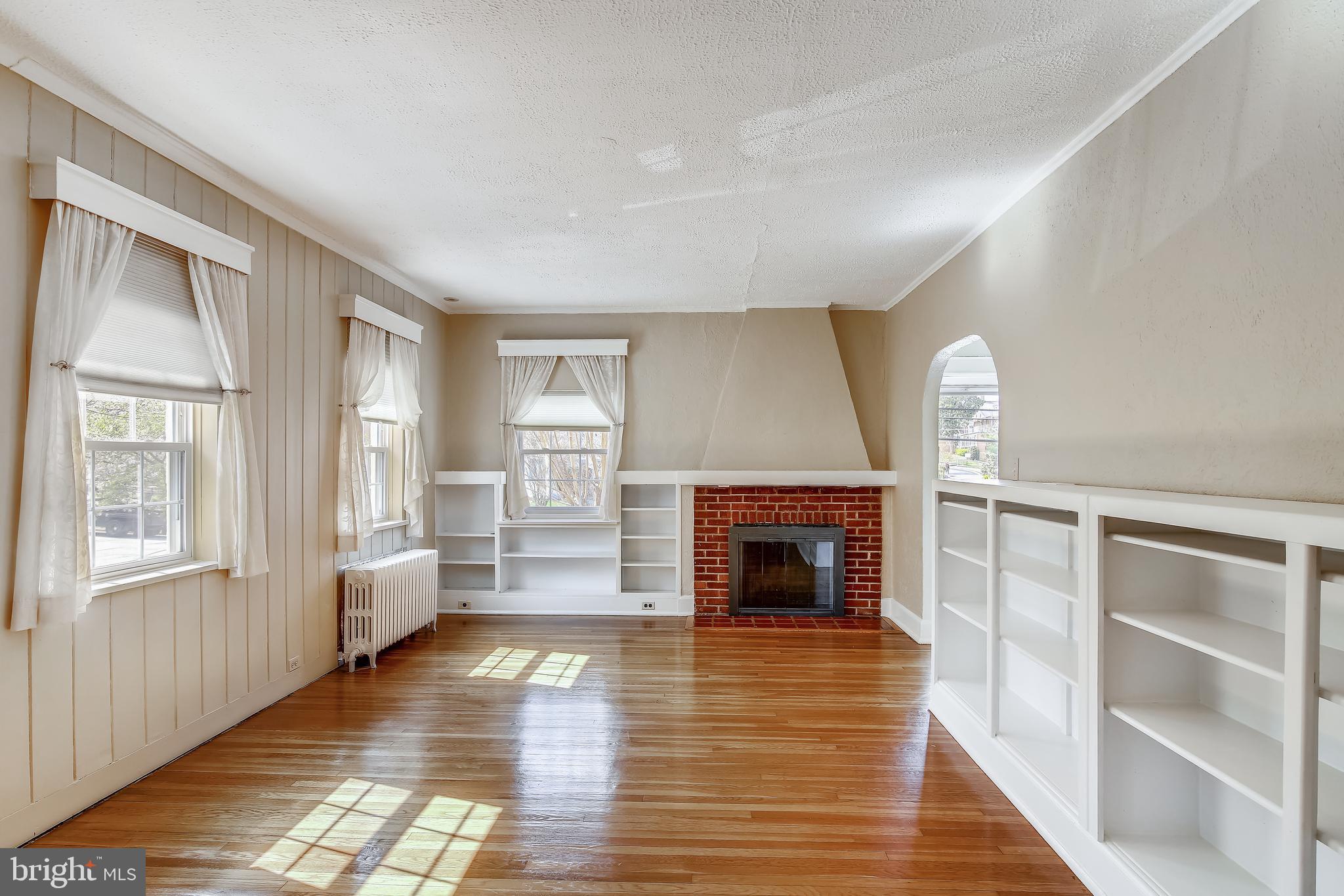 702 Wayne Avenue Silver Spring, MD 20910 - Photo 5 of 41 Living Room with fireplace