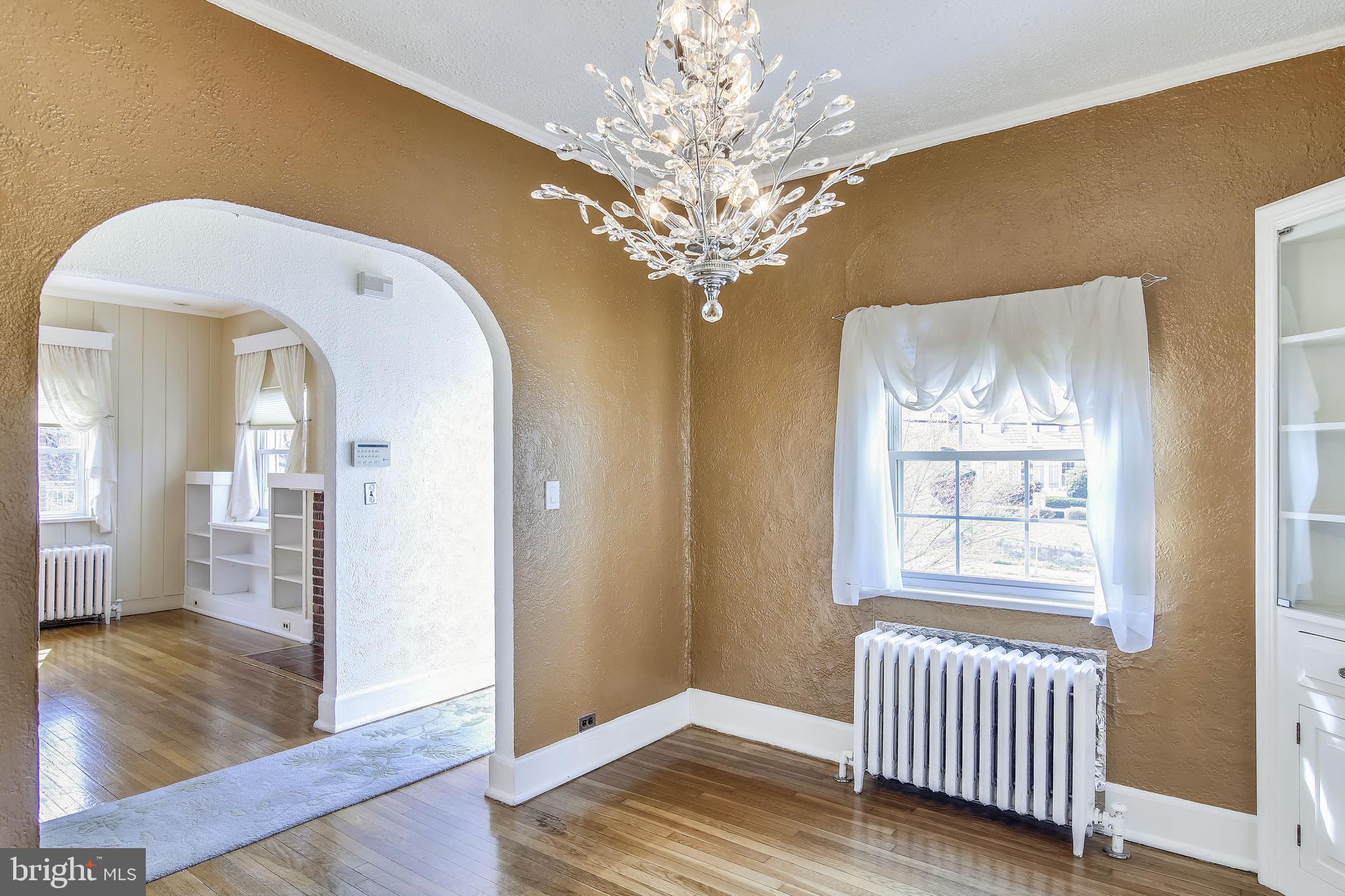 702 Wayne Avenue Silver Spring, MD 20910 - Photo 7 of 41 Dining room has lovely chandelier
