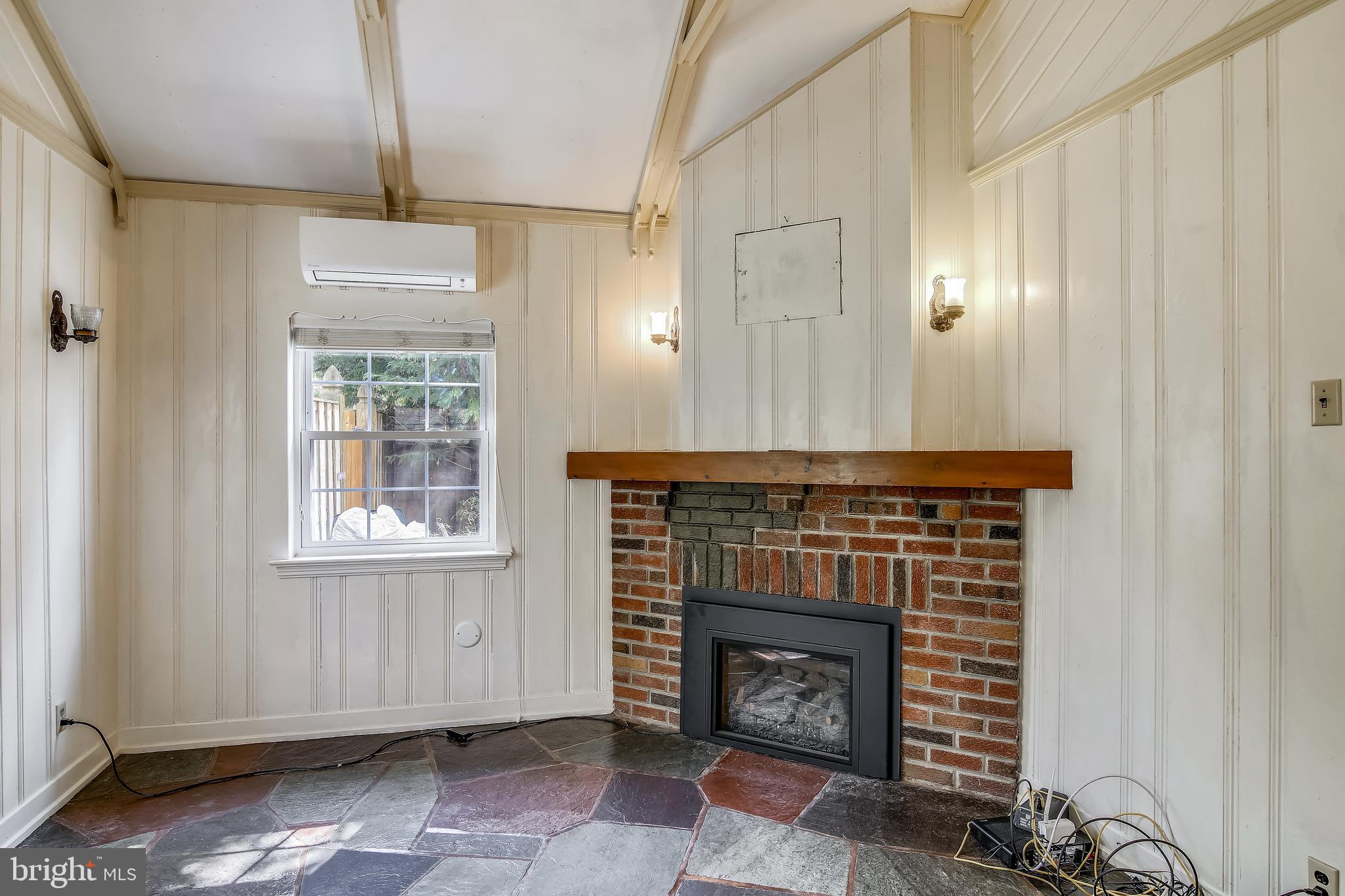 702 Wayne Avenue Silver Spring, MD 20910 - Photo 10 of 41 Family room with gas fireplace