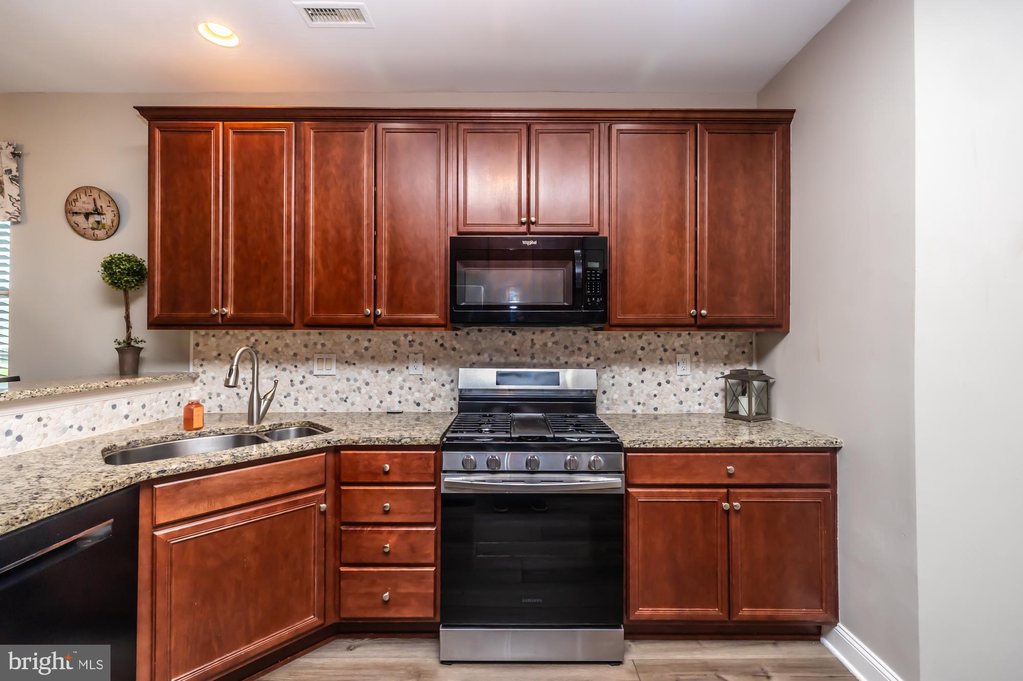 1105 Hulnick Road, Unit 43877 Coatesville, PA 19320 - Photo 14 of 38 Kitchen with gas stove