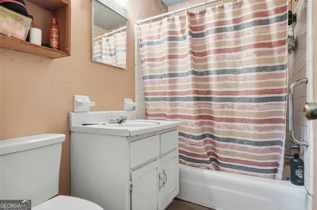 a bathroom with a sink and a toilet