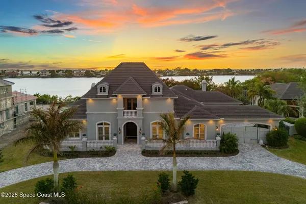 a aerial view of a house with big yard