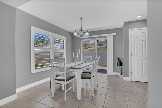 a kitchen with kitchen island a sink counter top space and appliances