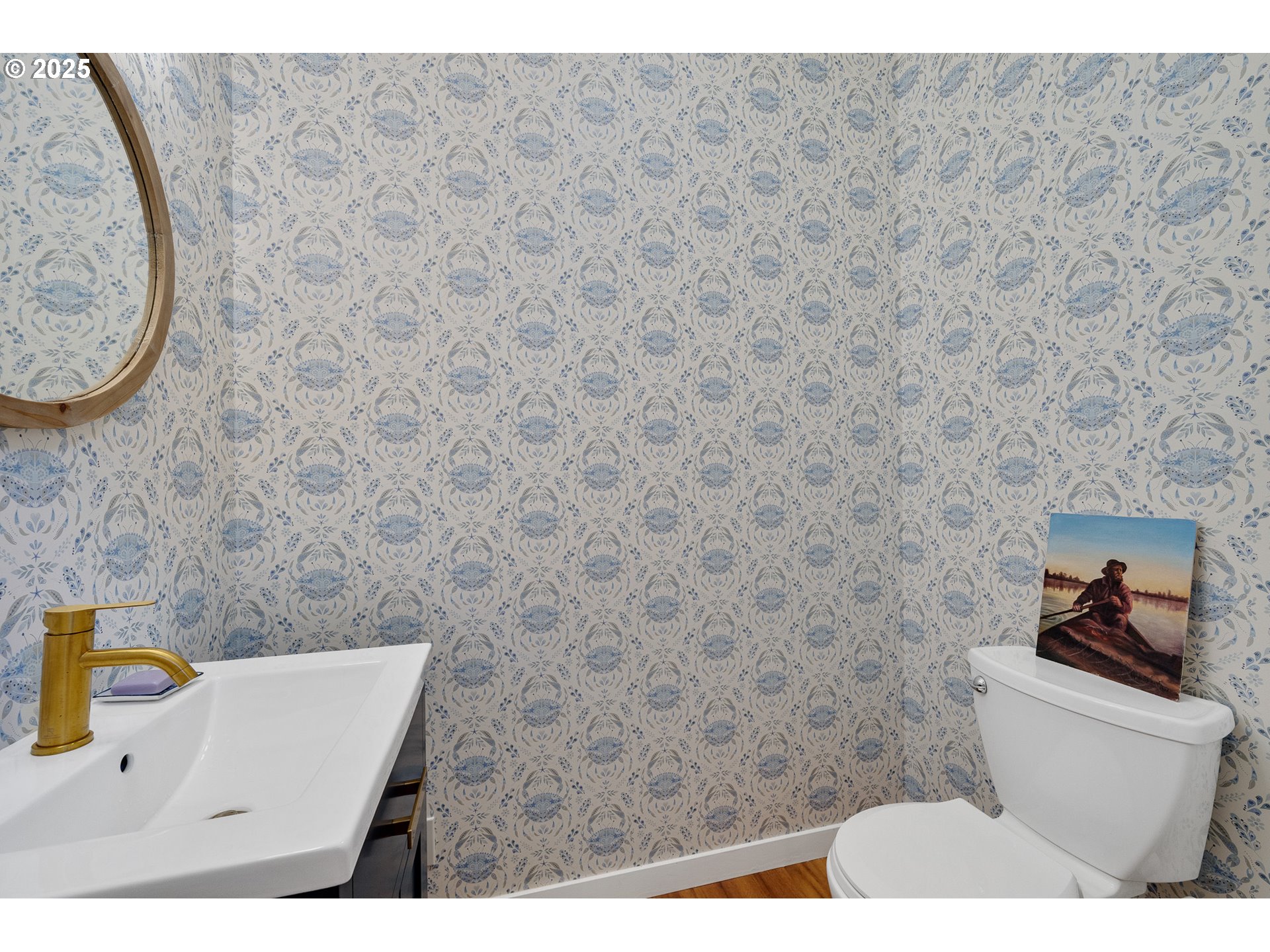 3308 Bayview Terrace Seaside, OR 97138 - Photo 26 of 48 a bathroom with a sink and a mirror