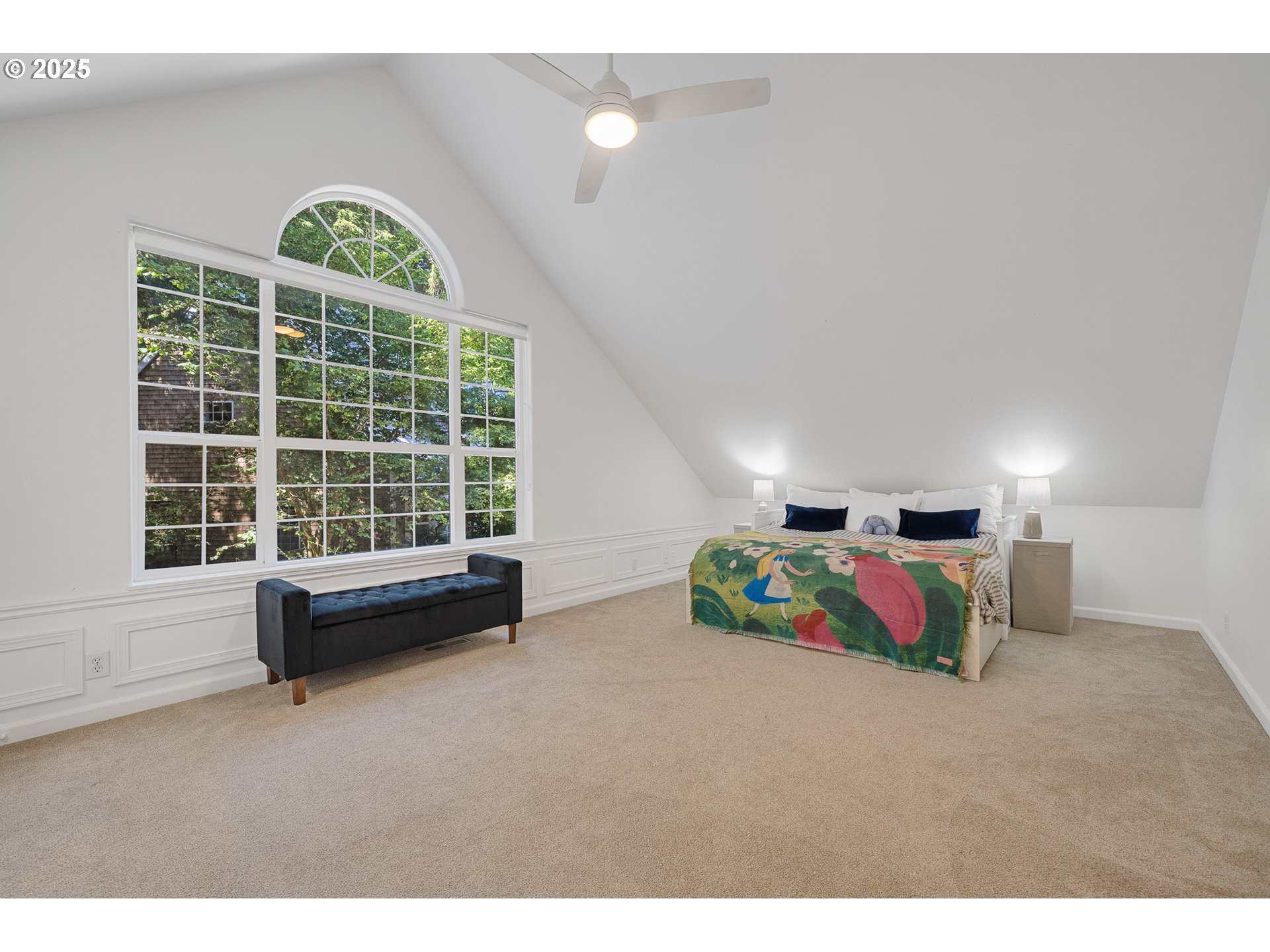3308 Bayview Terrace Seaside, OR 97138 - Photo 33 of 48 a bedroom with furniture and a large window