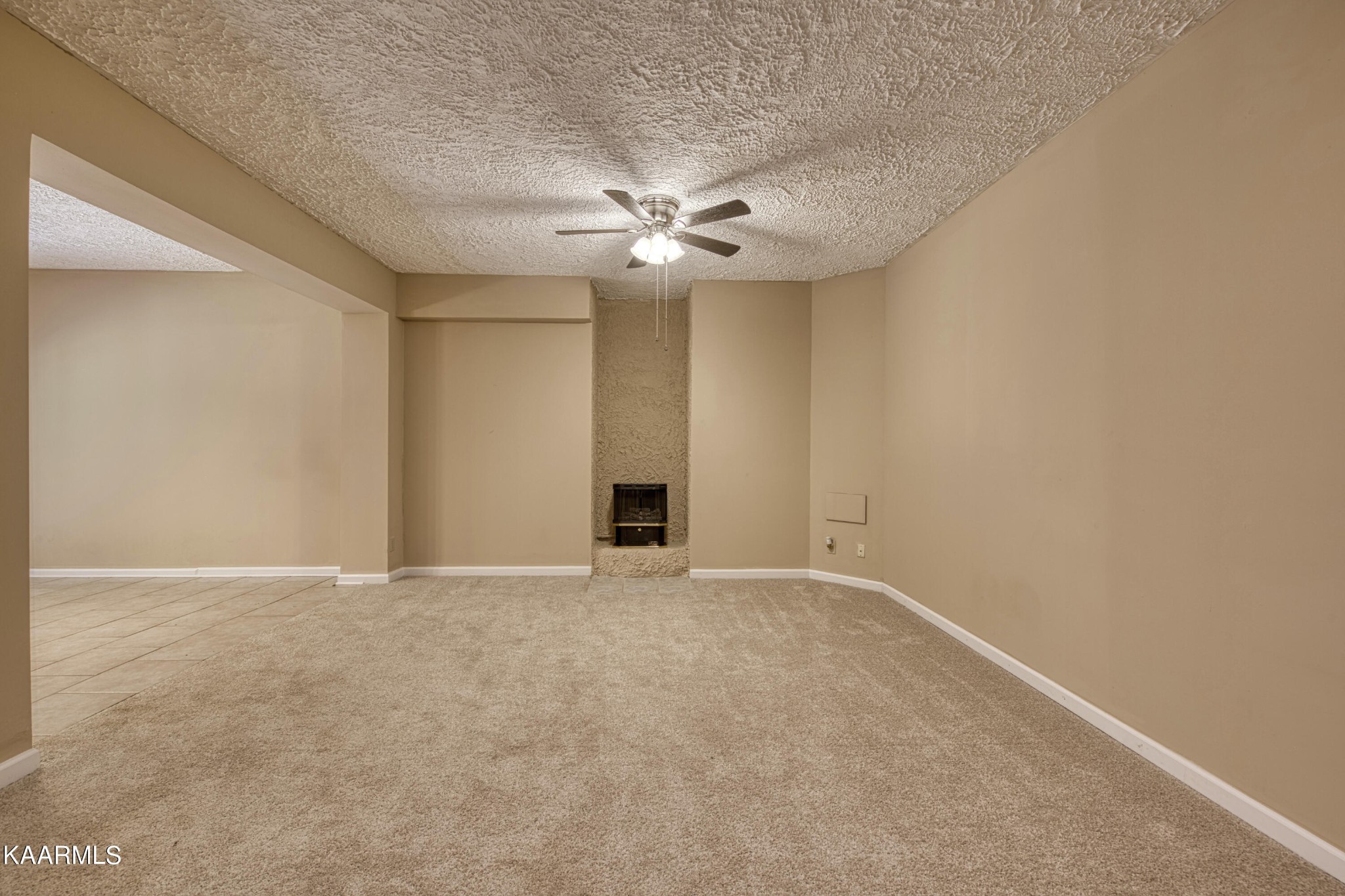 1859 Poplar Hill Road Knoxville, TN 37922 - Photo 15 of 39 a view of an empty room with a ceiling fan