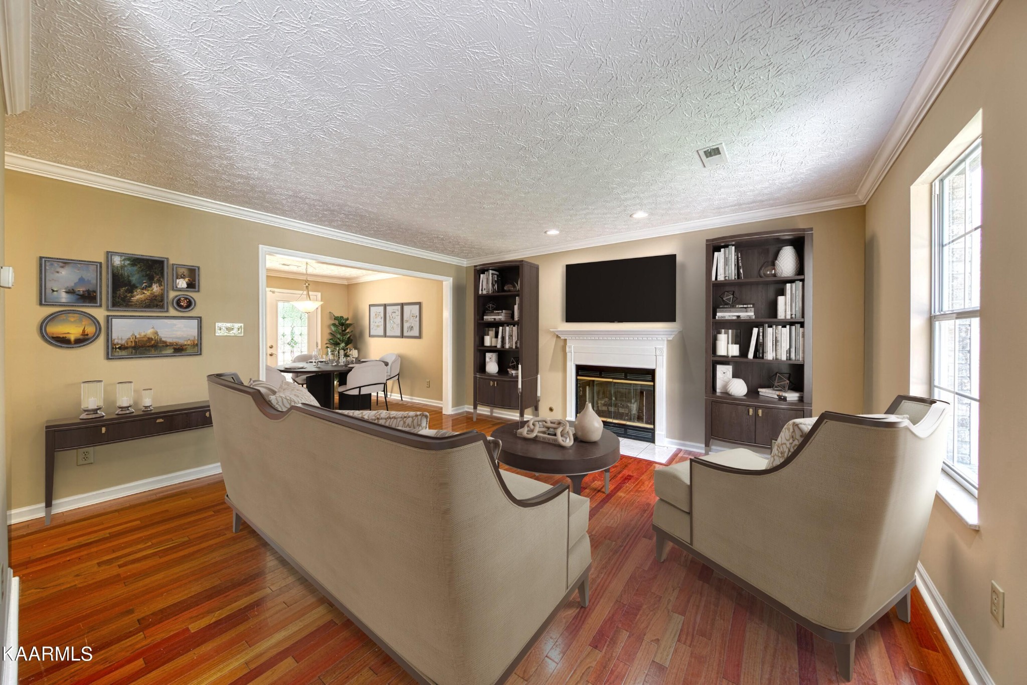1859 Poplar Hill Road Knoxville, TN 37922 - Photo 2 of 39 a living room with furniture a fireplace and a flat screen tv