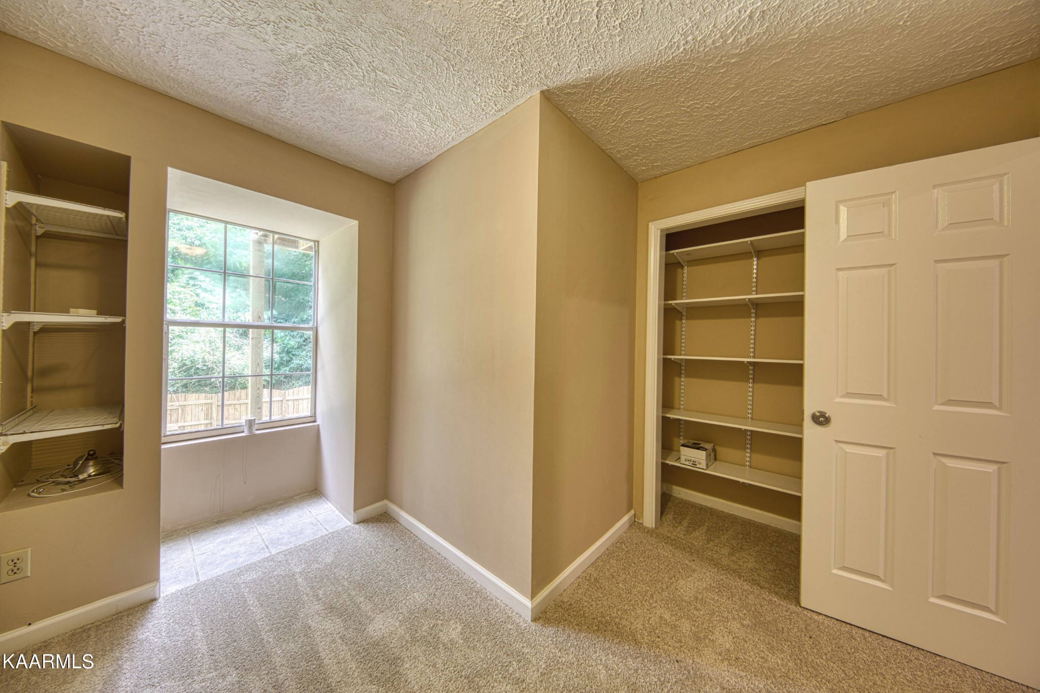 1859 Poplar Hill Road Knoxville, TN 37922 - Photo 27 of 39 a view of an empty room with a window
