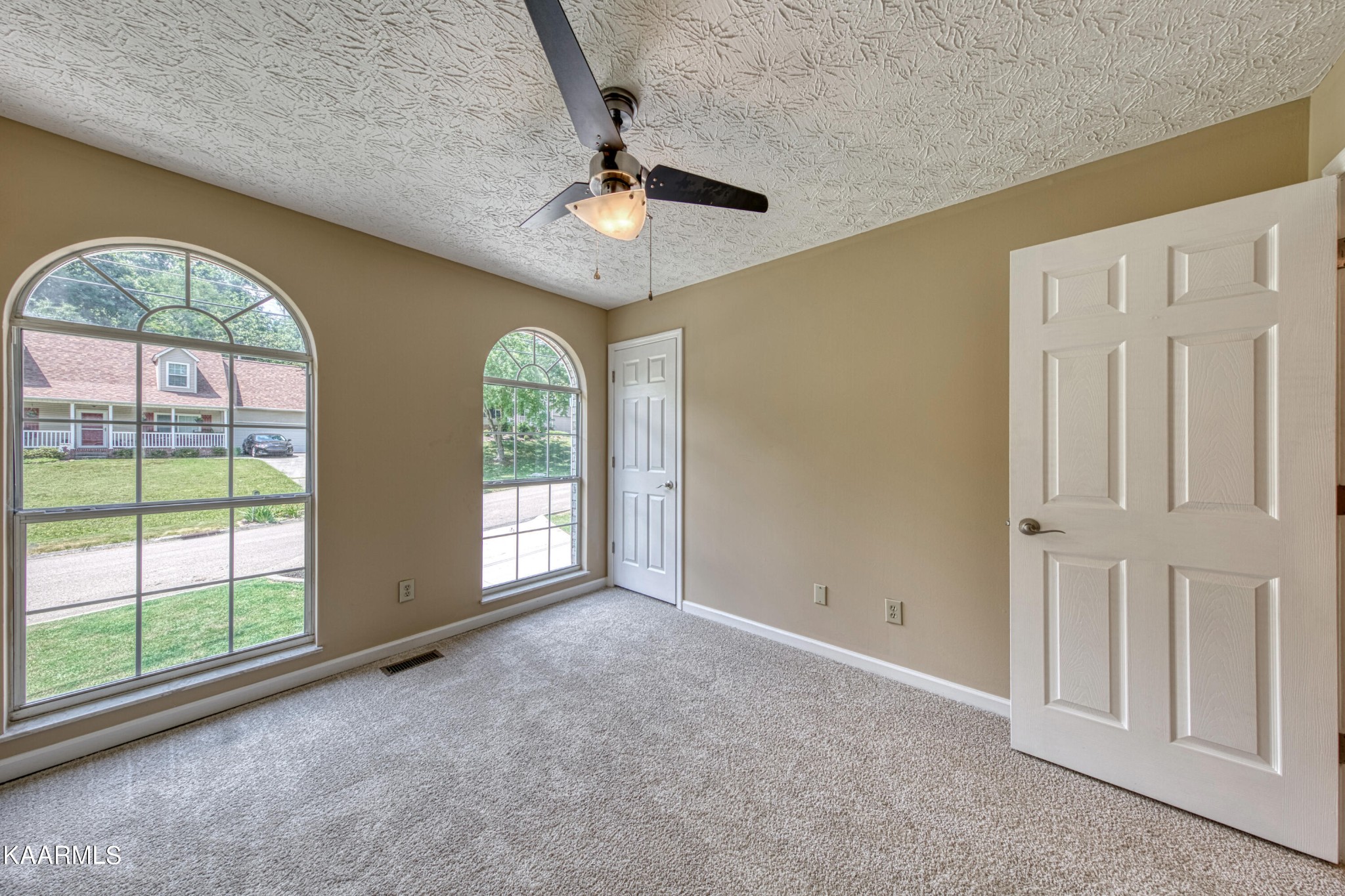 1859 Poplar Hill Road Knoxville, TN 37922 - Photo 29 of 39 an empty room with windows and outdoor view