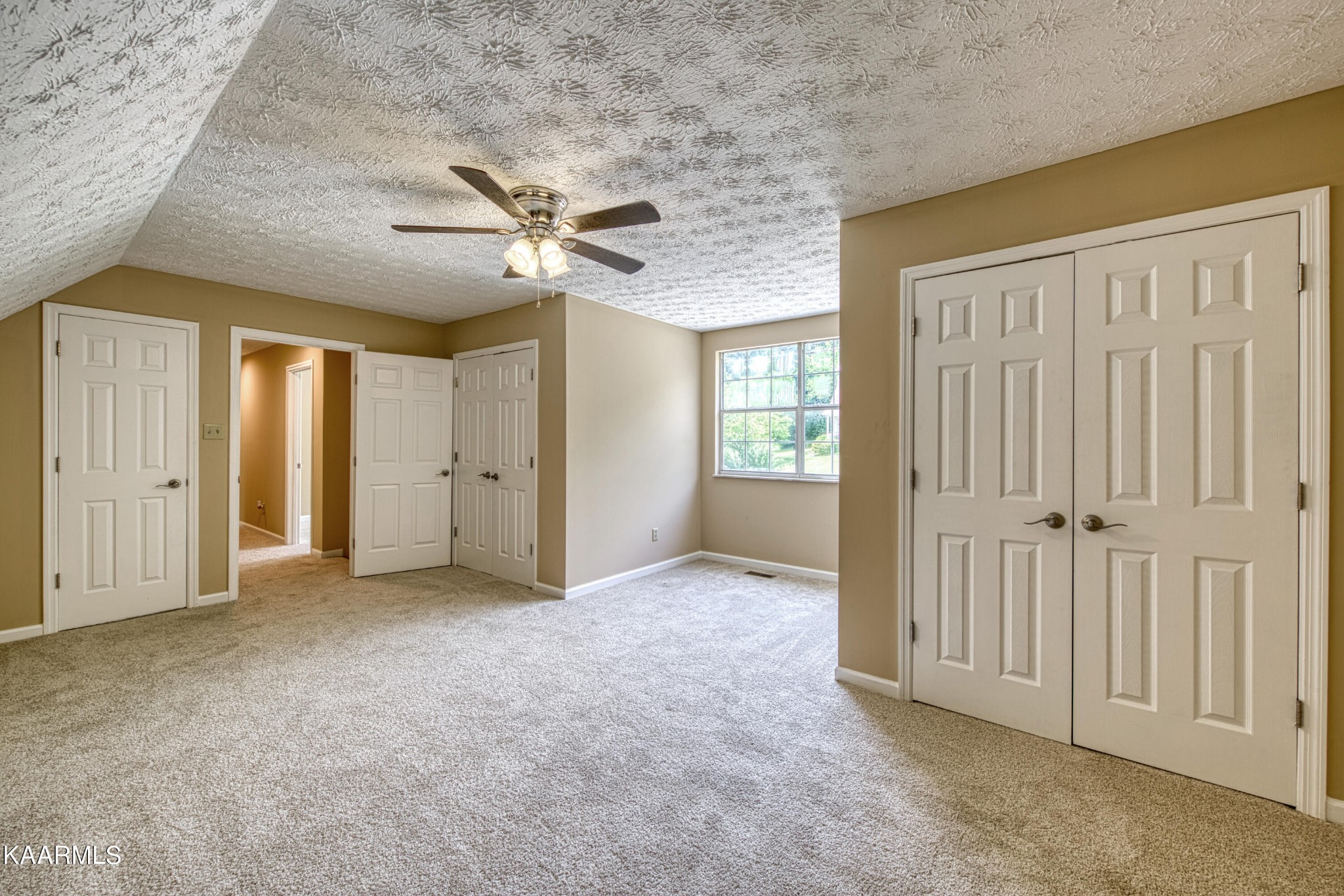 1859 Poplar Hill Road Knoxville, TN 37922 - Photo 34 of 39 an empty room with fan and windows