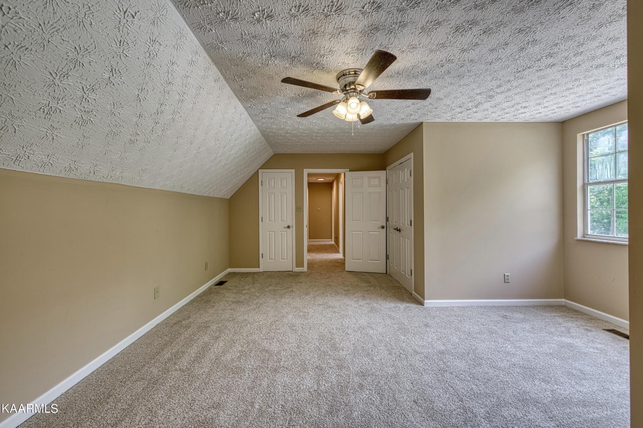 1859 Poplar Hill Road Knoxville, TN 37922 - Photo 35 of 39 a view of a livingroom with a ceiling fan and window