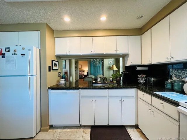 a view of a building with a garden