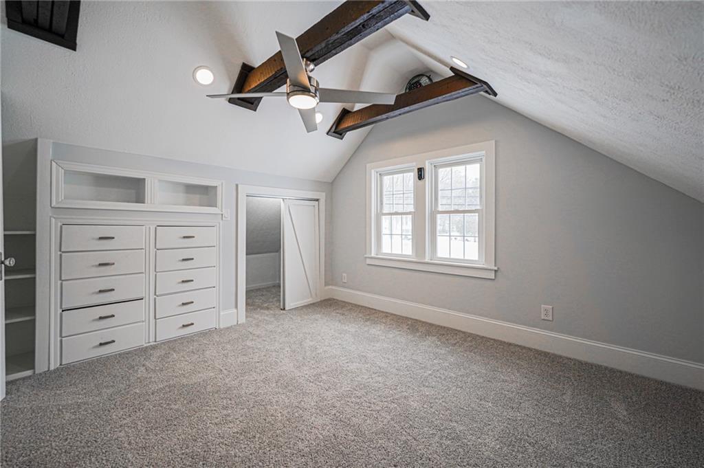 671 Old Rte 8 Harrisville, PA 16038 - Photo 45 of 49 an empty room with windows and ceiling fan