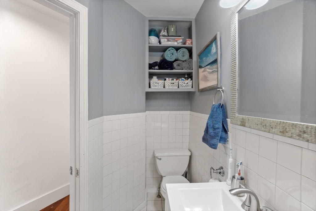 31 Regent Street, Unit 3R Cambridge, MA 02140 - Photo 18 of 28 a white toilet sitting next to a bathroom sink