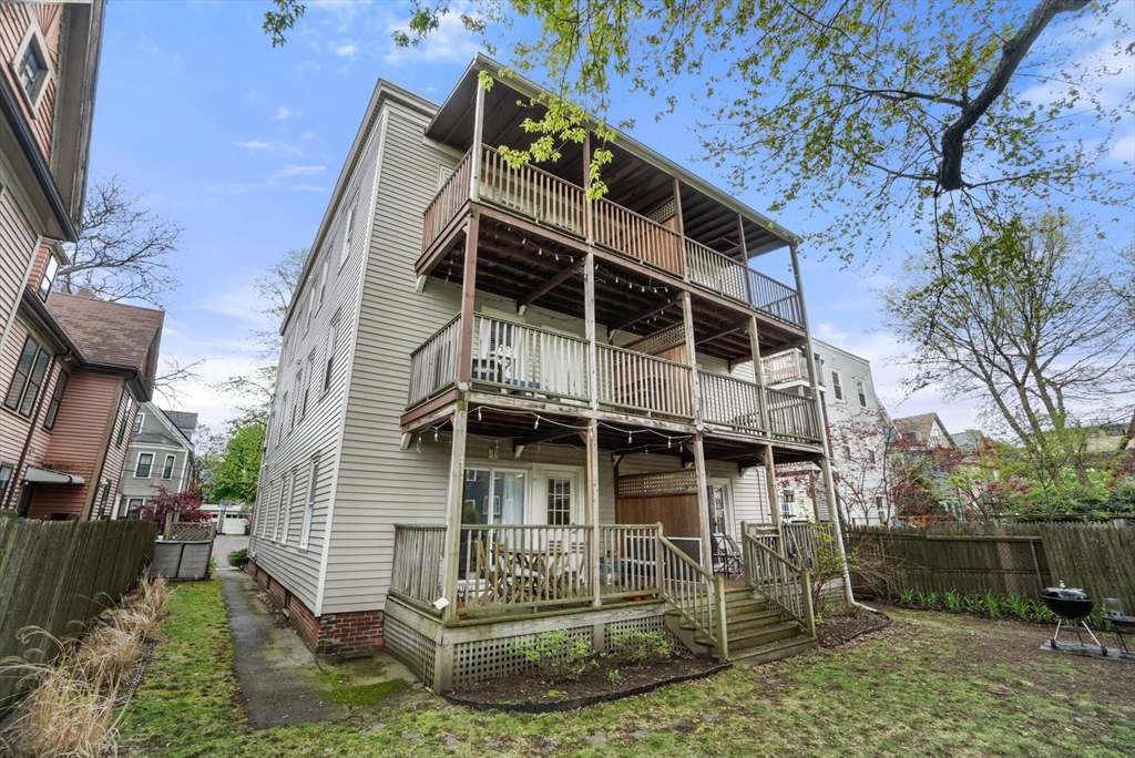 31 Regent Street, Unit 3R Cambridge, MA 02140 - Photo 27 of 28 a view of a house with a yard