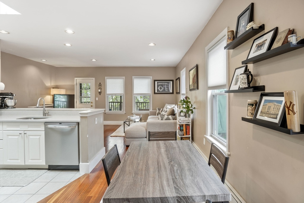 31 Regent Street, Unit 3R Cambridge, MA 02140 - Photo 7 of 28 a living room with furniture and a wooden floor