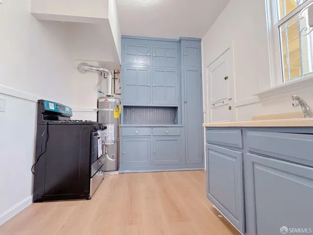 a bathroom with a sink a toilet and bathtub