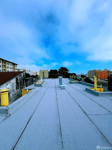 a view of swimming pool with furniture