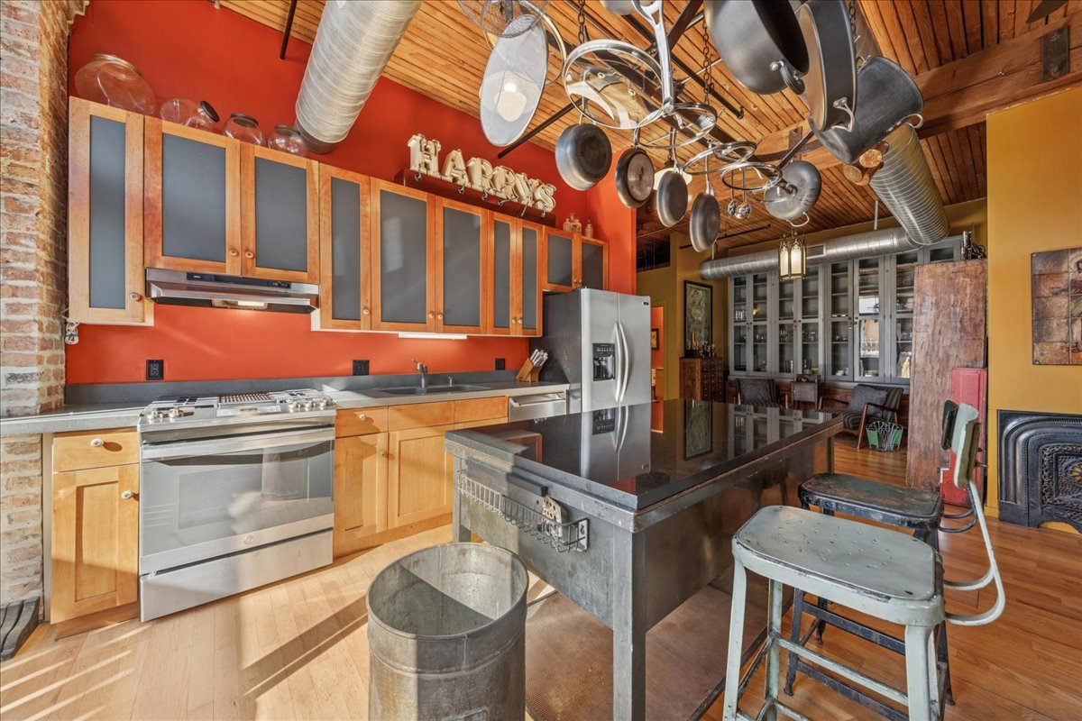 3500 South Sangamon Street, Unit 109 Chicago, IL 60609 - Photo 2 of 23 a front view of a building with street