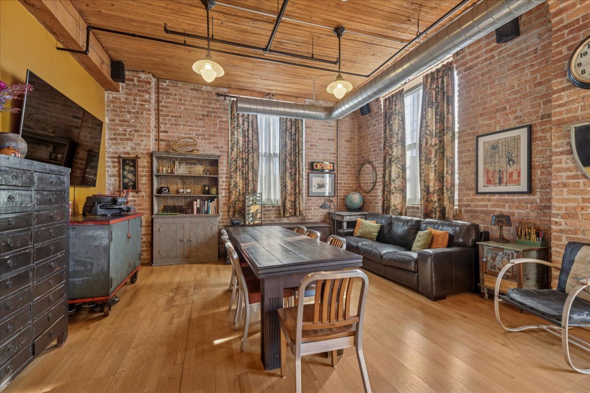 3500 South Sangamon Street, Unit 109 Chicago, IL 60609 - Photo 5 of 23 a outdoor space with patio furniture and a fireplace