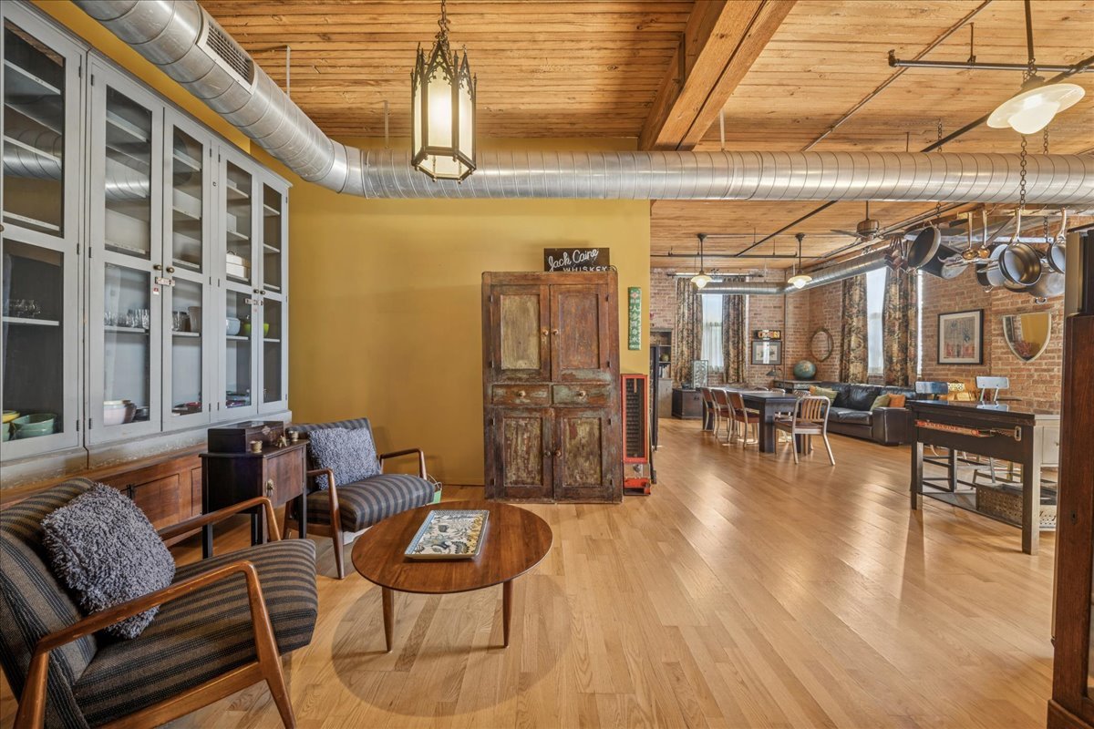 3500 South Sangamon Street, Unit 109 Chicago, IL 60609 - Photo 8 of 23 a living room with furniture and wooden floor