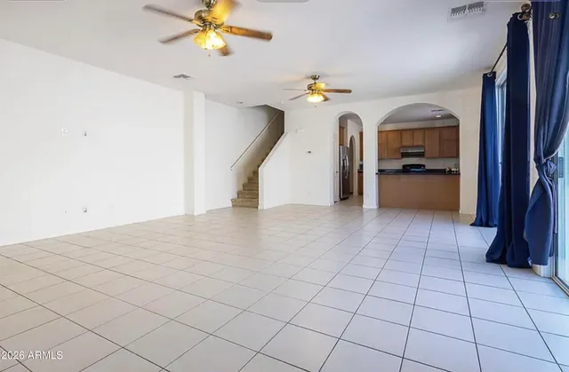 a view of entryway and kitchen