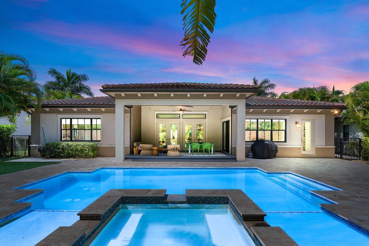 17662 Cadena Drive Boca Raton, FL 33496 - Photo 1 of 71 a view of swimming pool with outdoor seating