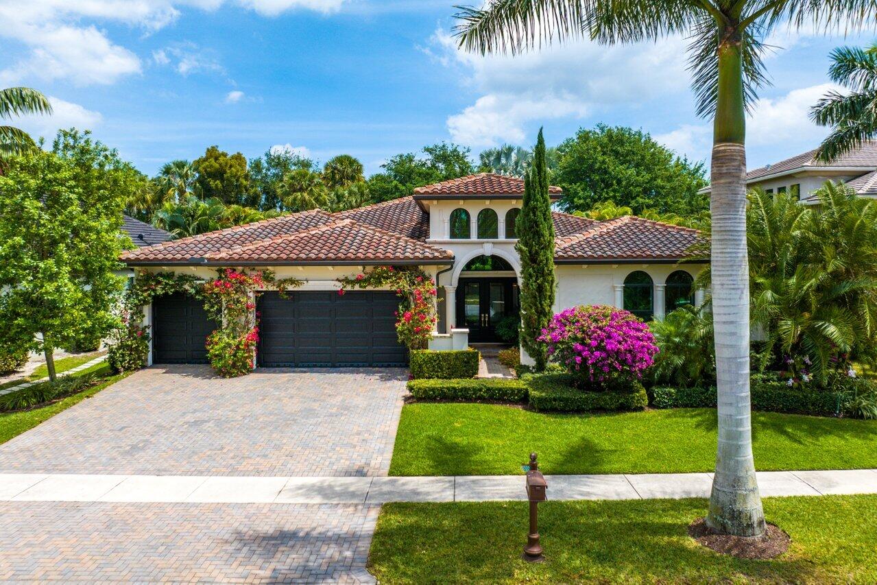 17662 Cadena Drive Boca Raton, FL 33496 - Photo 2 of 71 a front view of house with yard