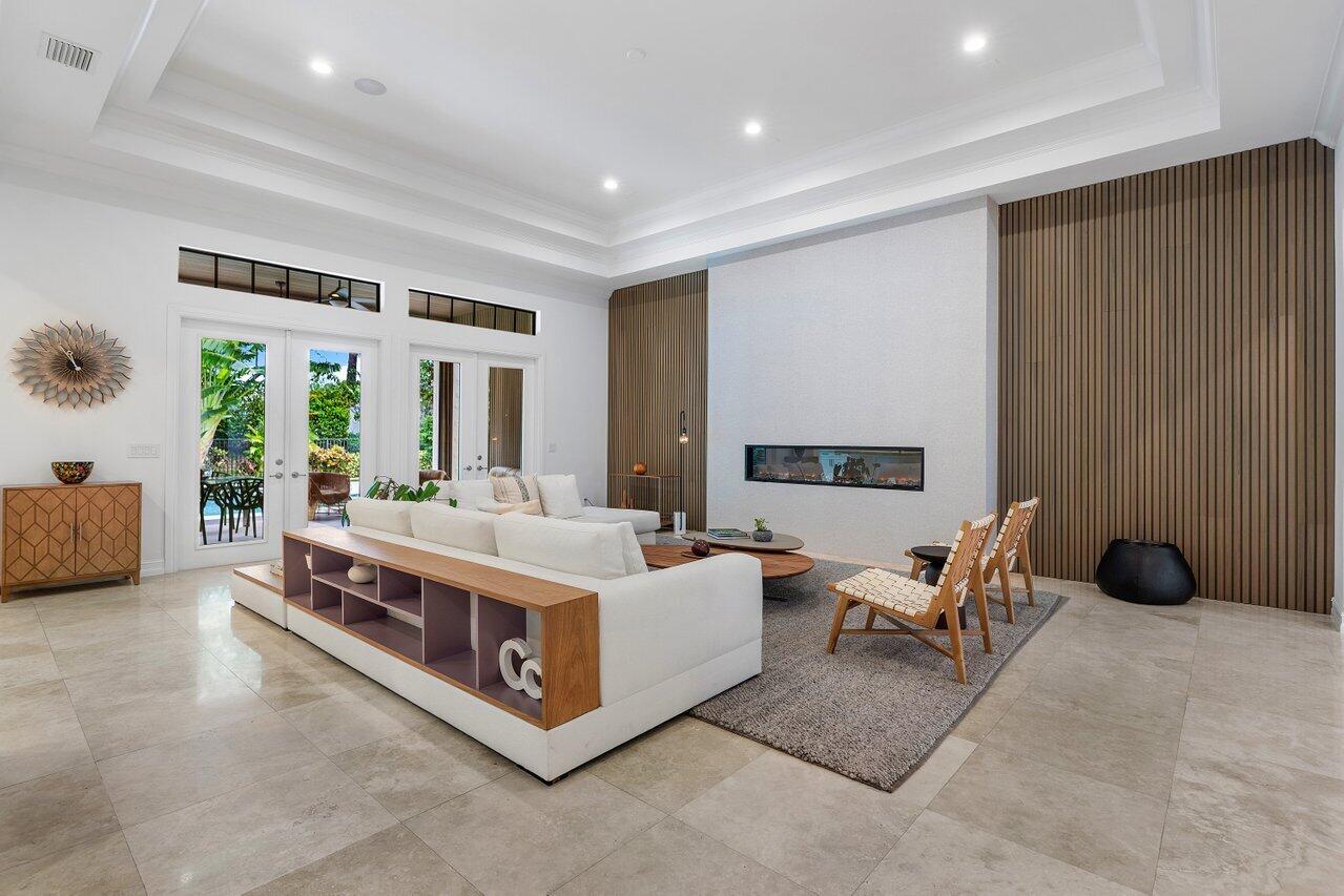17662 Cadena Drive Boca Raton, FL 33496 - Photo 28 of 71 a living room with furniture and a large window