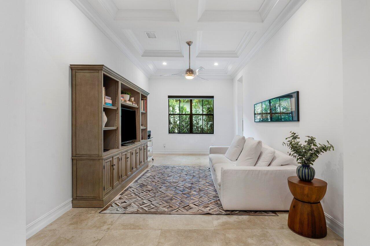 17662 Cadena Drive Boca Raton, FL 33496 - Photo 29 of 71 a living room with furniture and a flat screen tv