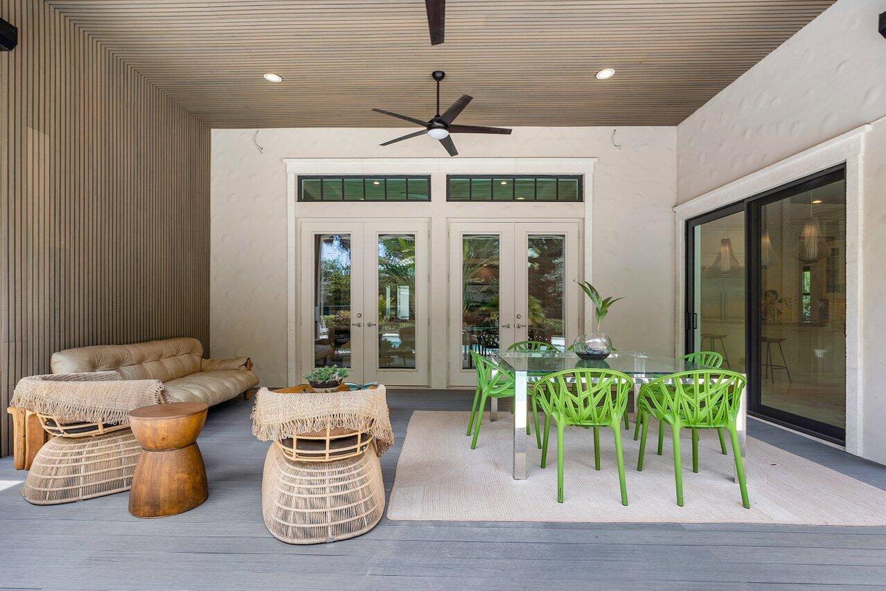 17662 Cadena Drive Boca Raton, FL 33496 - Photo 35 of 71 a dining room with furniture window and outdoor view