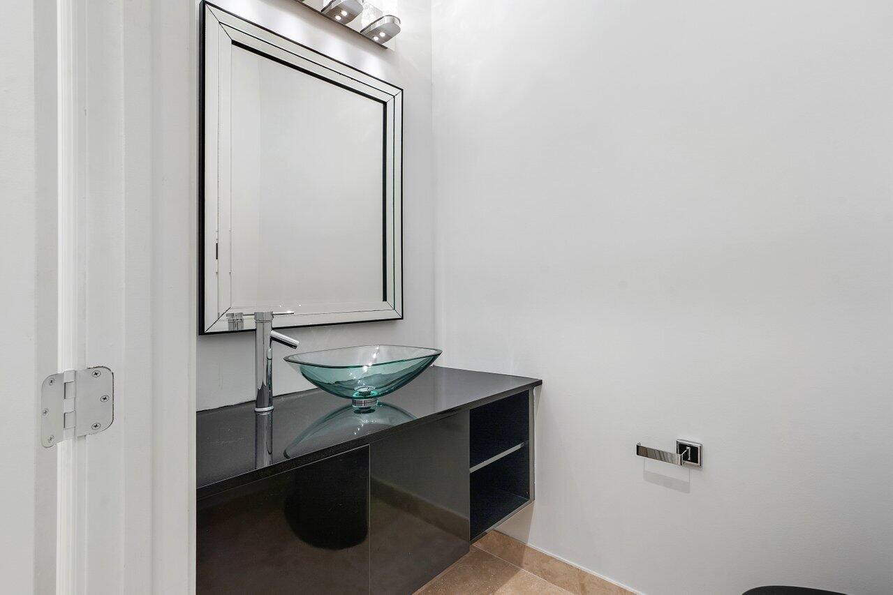 17662 Cadena Drive Boca Raton, FL 33496 - Photo 45 of 71 a bathroom with a granite countertop sink and a mirror