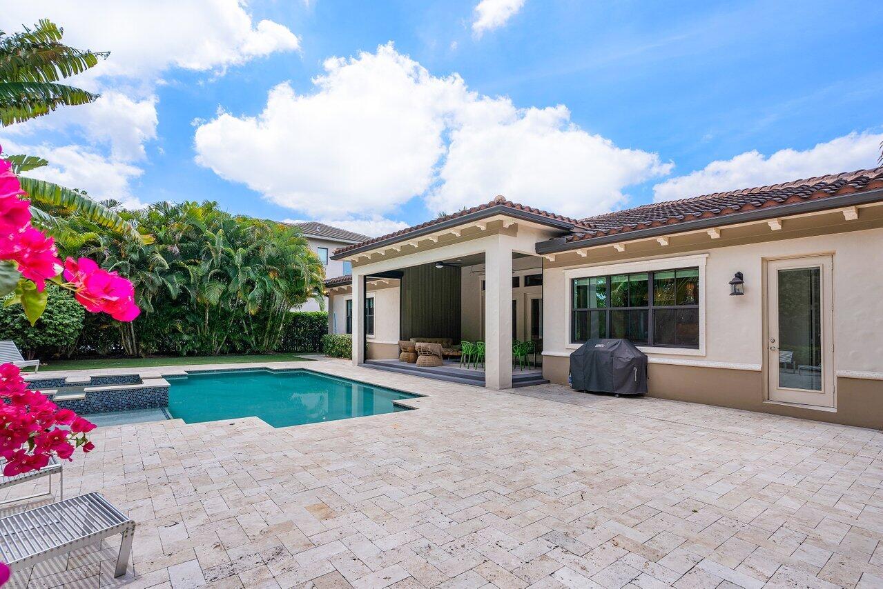 17662 Cadena Drive Boca Raton, FL 33496 - Photo 52 of 71 a view of house with outdoor space and swimming pool