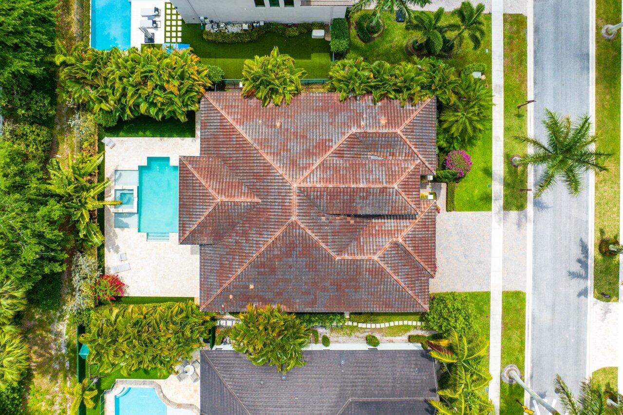 17662 Cadena Drive Boca Raton, FL 33496 - Photo 54 of 71 an aerial view of a house with a garden and a yard