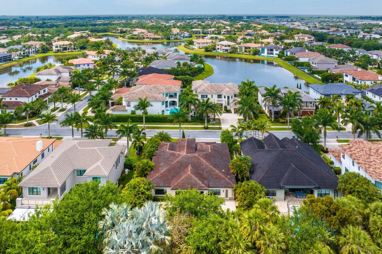 17662 Cadena Drive Boca Raton, FL 33496 - Photo 59 of 71 an aerial view of residential houses with outdoor space and a lake view
