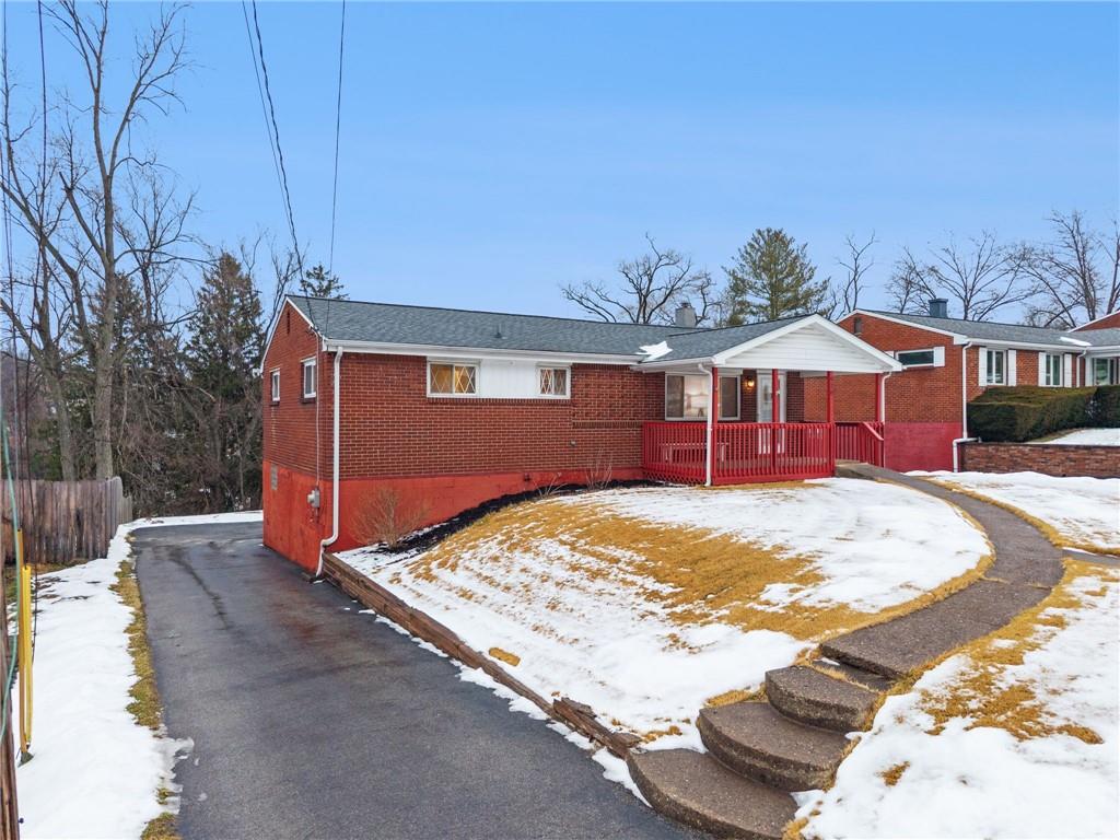 910 Colonial Manor Road Irwin, PA 15642 - Photo 2 of 40 a view of a house with entertaining space