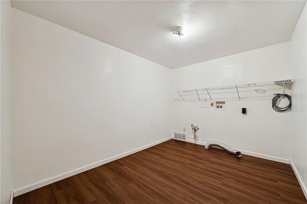 910 Colonial Manor Road Irwin, PA 15642 - Photo 25 of 40 a view of a room with wooden floor