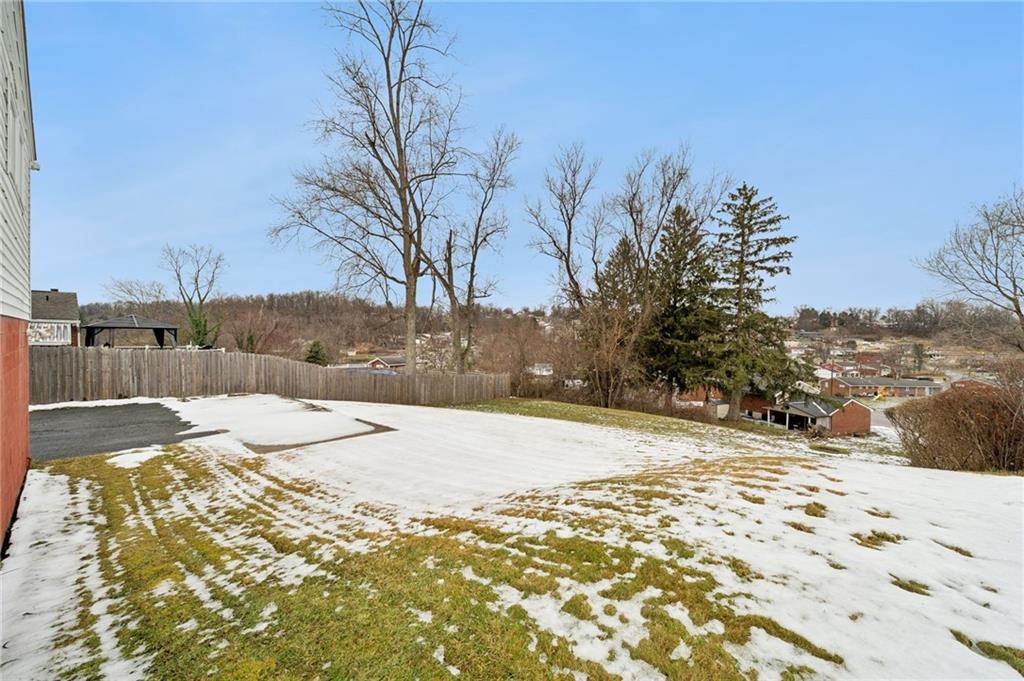 910 Colonial Manor Road Irwin, PA 15642 - Photo 34 of 40 a view of a backyard of snow