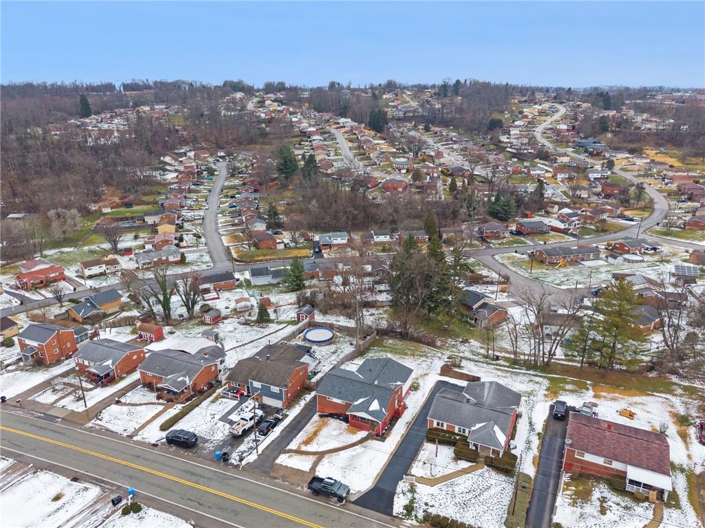 910 Colonial Manor Road Irwin, PA 15642 - Photo 39 of 40 an aerial view of residential houses with city view
