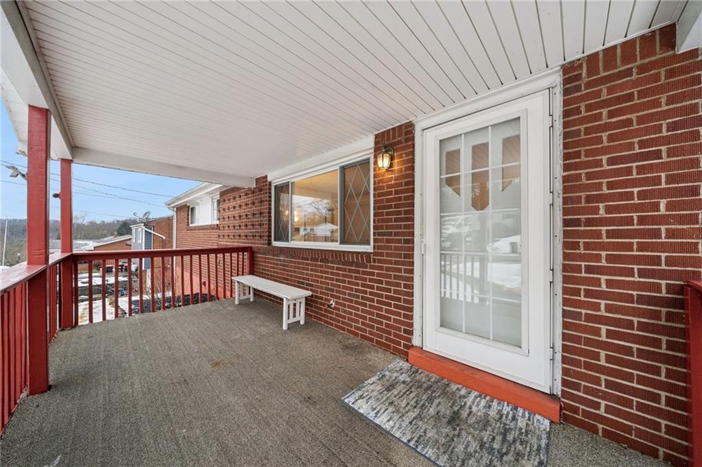 910 Colonial Manor Road Irwin, PA 15642 - Photo 5 of 40 a view of a balcony with chairs