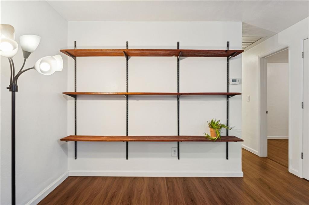 910 Colonial Manor Road Irwin, PA 15642 - Photo 8 of 40 a view of a room with wooden floor