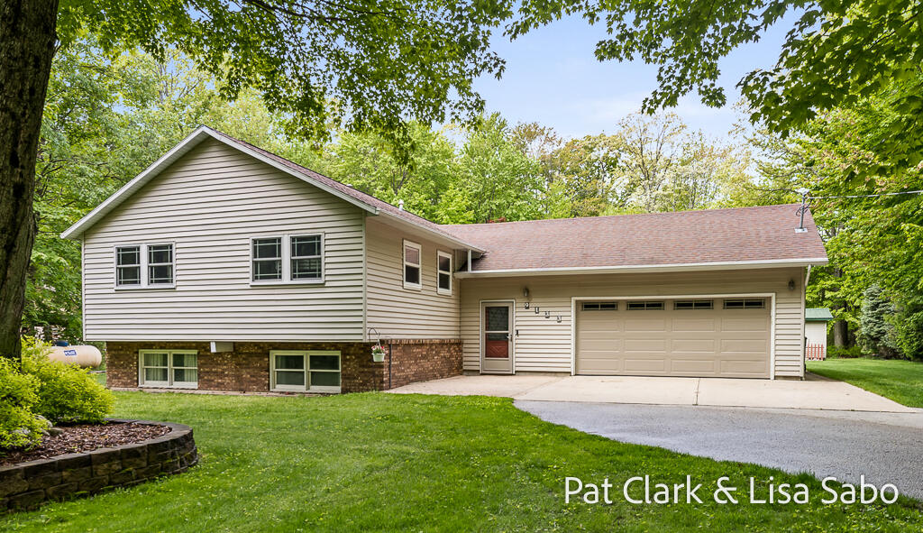 9133 Lamos Road Montague, MI 49437 - Photo 1 of 70 9133LamosRd-3LoRes